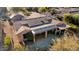 Aerial view of home's back patio and solar panels at 18932 N Aztec Point Dr, Surprise, AZ 85387