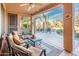 Enjoy outdoor living on this covered patio with serene desert views at 18932 N Aztec Point Dr, Surprise, AZ 85387