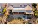 Aerial view of patio, pool, and backyard; solar panels at 18932 N Aztec Point Dr, Surprise, AZ 85387