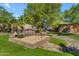 Community entrance with landscaping and signage at 200 E Southern Ave # 242, Tempe, AZ 85282