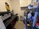 Handy workshop area with workbench and storage shelving at 200 E Southern Ave # 242, Tempe, AZ 85282
