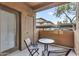 Private outdoor balcony area with seating provides a space for relaxation and offers views of the neighborhood at 20100 N 78Th Pl # 1062, Scottsdale, AZ 85255