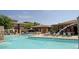 Resort-style community pool with water features and lounge seating for relaxation and enjoyment at 20100 N 78Th Pl # 1062, Scottsdale, AZ 85255