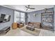 Inviting living room showcasing contemporary decor, natural light, and a rustic decorative barrel at 20100 N 78Th Pl # 1062, Scottsdale, AZ 85255