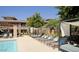 Relaxing poolside lounges with comfortable seating and shade, perfect for sunny days and relaxation at 20100 N 78Th Pl # 1062, Scottsdale, AZ 85255