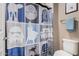 Bathroom with Star Wars themed shower curtain at 20562 E Raven Dr, Queen Creek, AZ 85142
