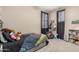 Comfortable bedroom with a twin bed and window at 20562 E Raven Dr, Queen Creek, AZ 85142