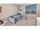 Charming bedroom with a twin-size bed and window at 20562 E Raven Dr, Queen Creek, AZ 85142