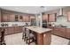 Eat-in kitchen with granite countertops and ample cabinet space at 20562 E Raven Dr, Queen Creek, AZ 85142