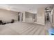 Spacious loft area with plush carpeting and natural light at 20562 E Raven Dr, Queen Creek, AZ 85142