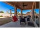 Relaxing patio area with seating and a hammock at 20562 E Raven Dr, Queen Creek, AZ 85142