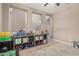 Playroom with built-in storage and toy organization at 20562 E Raven Dr, Queen Creek, AZ 85142