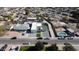 Aerial view showcasing a single-story home with a pool and spacious backyard at 2129 S Los Feliz Dr, Tempe, AZ 85282