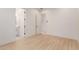 Spacious bedroom with wood floors and an ensuite bathroom at 2129 S Los Feliz Dr, Tempe, AZ 85282