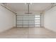Clean and spacious garage with overhead storage at 2129 S Los Feliz Dr, Tempe, AZ 85282