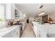 Spacious kitchen with white cabinets, marble island, and gas range at 2129 S Los Feliz Dr, Tempe, AZ 85282