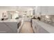 Modern kitchen boasts white cabinets and marble countertops at 2129 S Los Feliz Dr, Tempe, AZ 85282