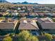 Aerial view of home with pool, mountain backdrop at 2238 E Saddlebrook Rd, Gilbert, AZ 85298