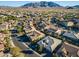 Aerial view of home with pool, mountain backdrop at 2238 E Saddlebrook Rd, Gilbert, AZ 85298