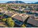Aerial view of home with pool, mountain backdrop at 2238 E Saddlebrook Rd, Gilbert, AZ 85298