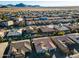 Aerial view of home with pool, mountain backdrop at 2238 E Saddlebrook Rd, Gilbert, AZ 85298