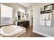 Spa-like bathroom with soaking tub, double vanity and walk-in shower at 2238 E Saddlebrook Rd, Gilbert, AZ 85298