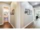 Small half bathroom with pedestal sink and framed artwork at 2238 E Saddlebrook Rd, Gilbert, AZ 85298