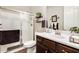 Modern bathroom with a large shower and dark wood vanity at 2238 E Saddlebrook Rd, Gilbert, AZ 85298