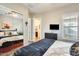 Bedroom with mirrored closet and en-suite bathroom access at 2238 E Saddlebrook Rd, Gilbert, AZ 85298