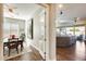 Bright dining room features a wood table with chairs and a large piece of art at 2238 E Saddlebrook Rd, Gilbert, AZ 85298