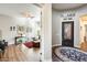 Elegant entryway with a circular rug and a dark-colored front door at 2238 E Saddlebrook Rd, Gilbert, AZ 85298
