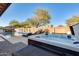 Soothing hot tub with a view of the sparkling pool and backyard at 2238 E Saddlebrook Rd, Gilbert, AZ 85298