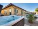 Luxurious hot tub nestled in the backyard, next to the pool and patio at 2238 E Saddlebrook Rd, Gilbert, AZ 85298