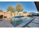Inviting pool with water feature and ample patio space at 2238 E Saddlebrook Rd, Gilbert, AZ 85298