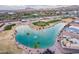 Aerial view of community with lake and golf course at 2651 N Lema Dr, Mesa, AZ 85215