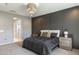 Serene bedroom with a cozy bed and ensuite bathroom access at 27165 N 71St Ln, Peoria, AZ 85383