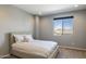 Bright bedroom with a bed and mountain views at 27165 N 71St Ln, Peoria, AZ 85383