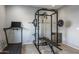 Home gym with treadmill and weightlifting equipment at 27165 N 71St Ln, Peoria, AZ 85383