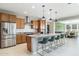 Modern kitchen with granite countertops and stainless steel appliances at 27165 N 71St Ln, Peoria, AZ 85383