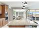 Open kitchen with large island and view to Gathering room at 27165 N 71St Ln, Peoria, AZ 85383