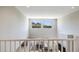 Upstairs loft with two windows offering scenic mountain views at 27165 N 71St Ln, Peoria, AZ 85383