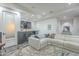 Spacious basement recreation room with wet bar and comfortable seating at 30 W Palm Ln, Phoenix, AZ 85003
