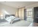 Bright bedroom with a king-size bed and mirrored closet at 30 W Palm Ln, Phoenix, AZ 85003