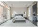 Well-lit bedroom with hardwood floors and city views at 30 W Palm Ln, Phoenix, AZ 85003