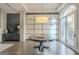 Dining area with dark wood table, chandelier, and built-in shelving at 30 W Palm Ln, Phoenix, AZ 85003