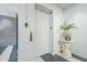 Building elevator with white walls and decorative vase at 30 W Palm Ln, Phoenix, AZ 85003