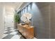 Elegant entryway with wood console table and gray walls at 30 W Palm Ln, Phoenix, AZ 85003