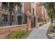 Brick building with iron gate and walkway at 30 W Palm Ln, Phoenix, AZ 85003