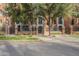 Community entrance with gated access and landscaping at 30 W Palm Ln, Phoenix, AZ 85003