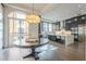 Modern kitchen with dark cabinetry, marble countertops, and stainless steel appliances at 30 W Palm Ln, Phoenix, AZ 85003